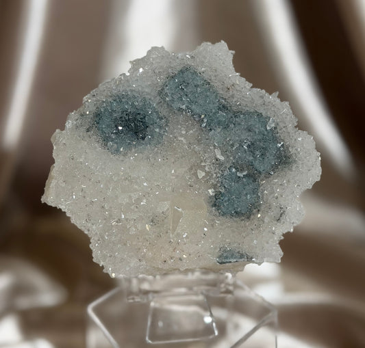 Coated Calcite on Blue Quartz