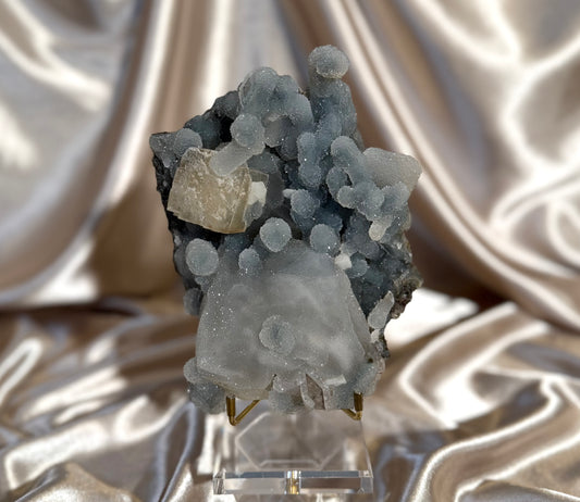 Coated Calcite on Blue Chalcedony Stalactites