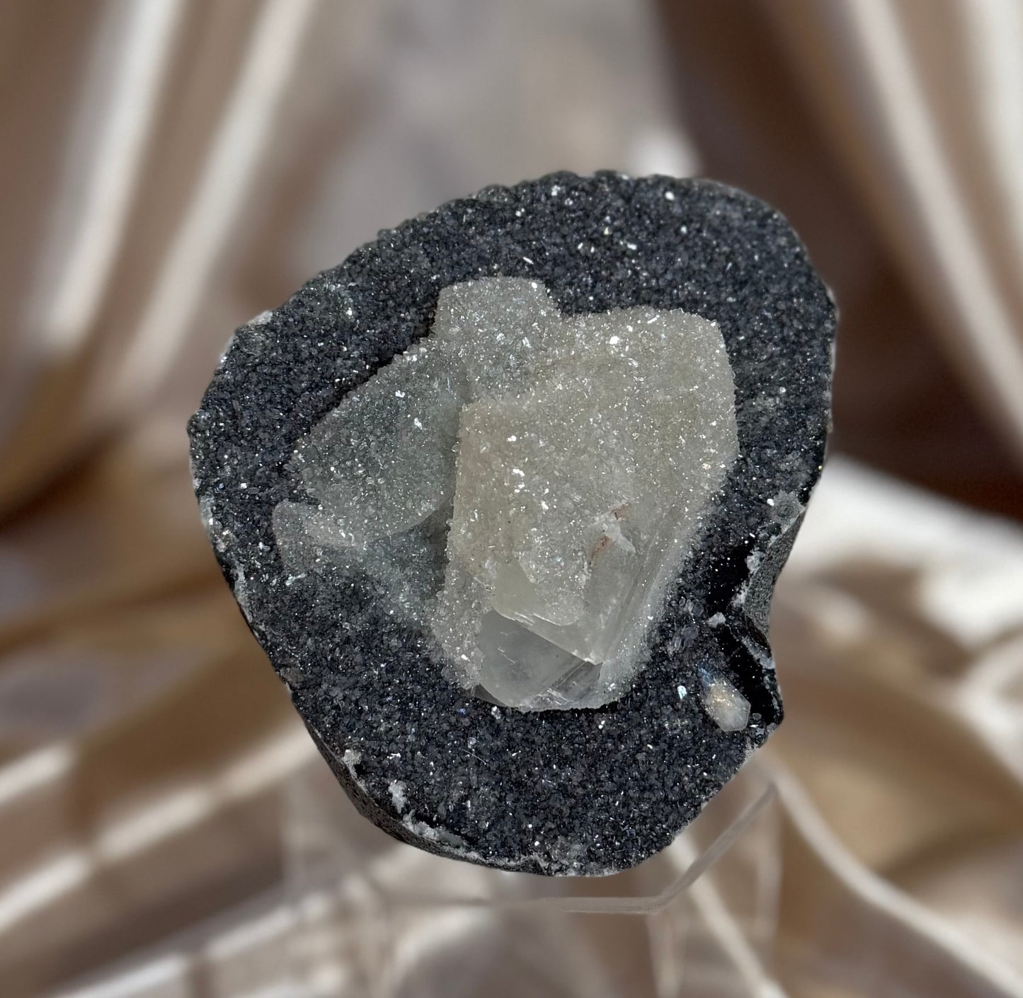 Coated calcite on Blue Quartz