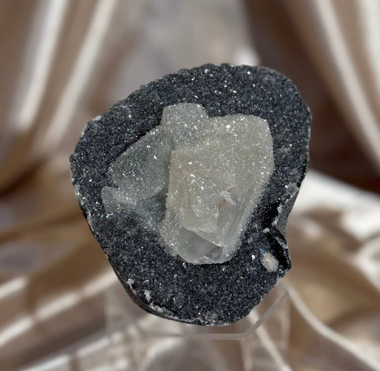 Coated calcite on Blue Quartz